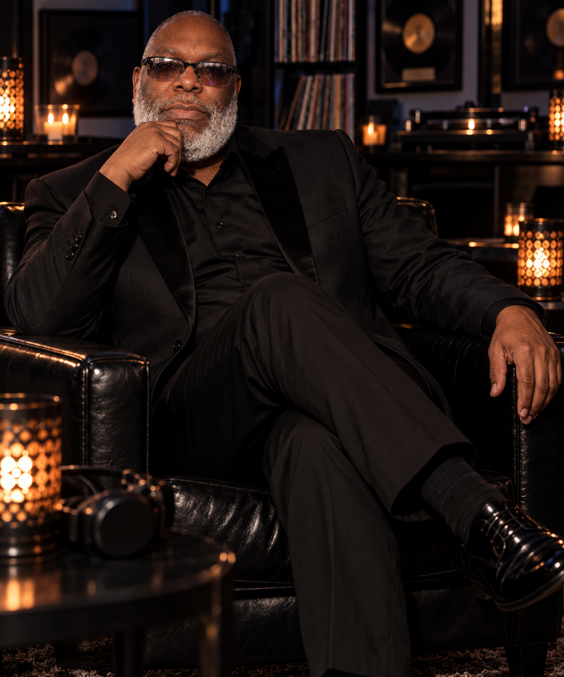 Neal McFarlane, DJ XTC, seated in a record room